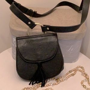 Street level crossbody. Nice hardware with tassel